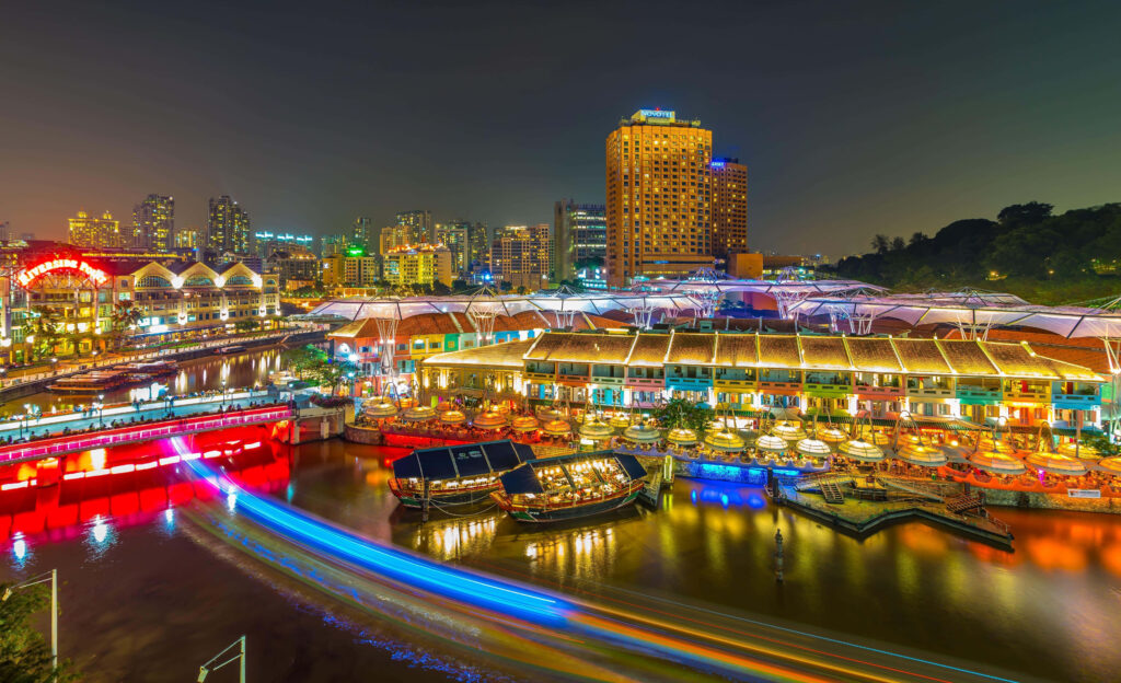 Vibrant Clarke Quay Night View: Illuminated River & City Life Wallpaper