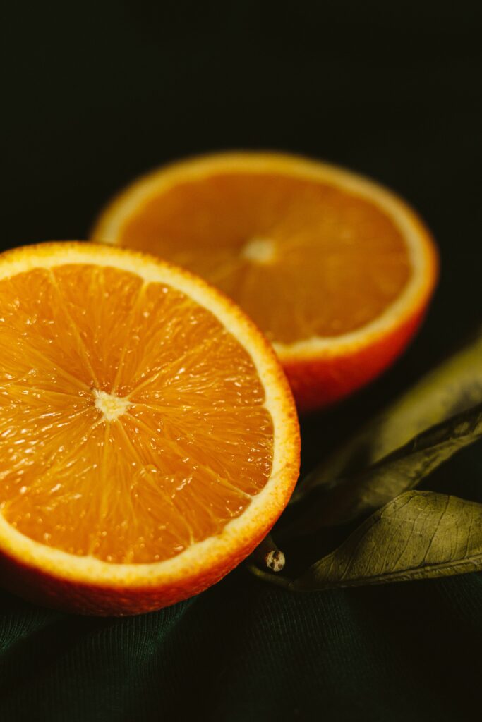 Vibrant Orange Close-Up Wallpaper: Juicy Citrus Texture on Dark Backdrop
