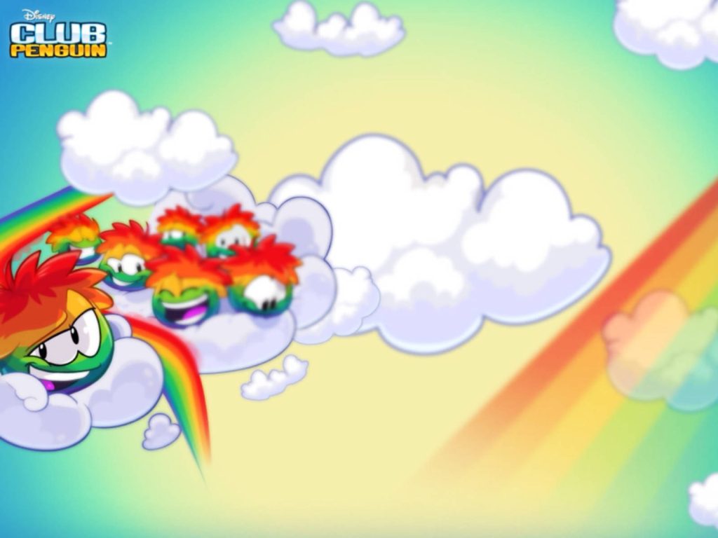 Rainbow-colored Puffles floating on clouds with a bright rainbow Club Penguin wallpaper background