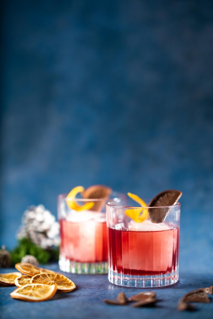 Vibrant Cocktail Wallpaper: Refreshing Glasses & Blue Background