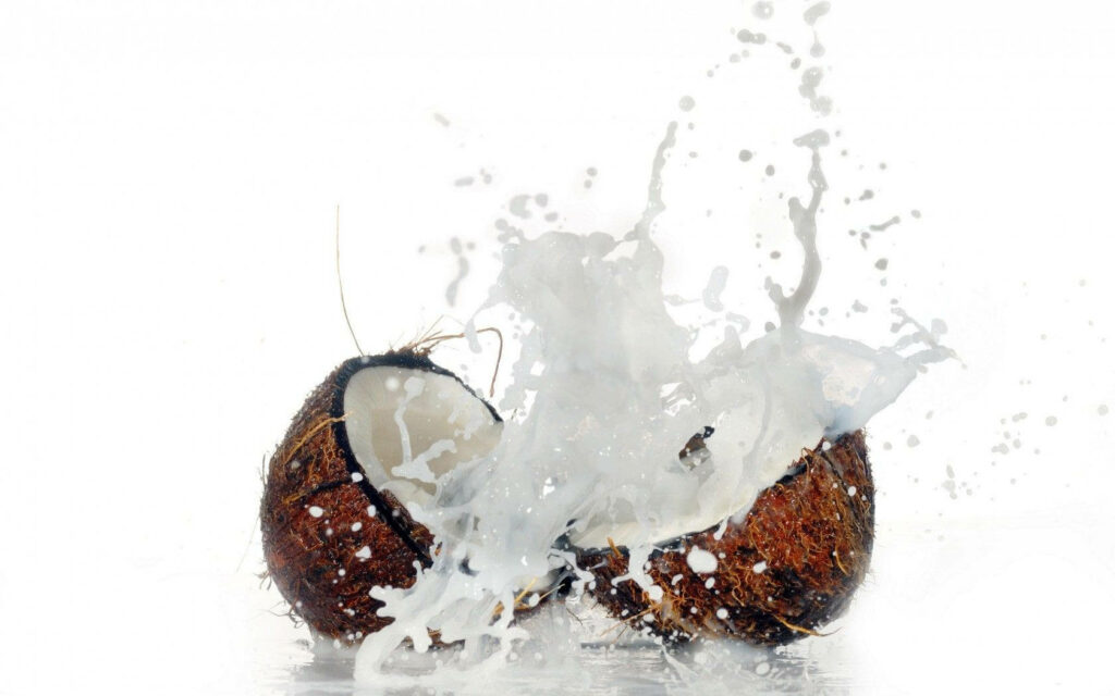 Tropical Coconut Water Splash Wallpaper: Refreshing & Vibrant Background