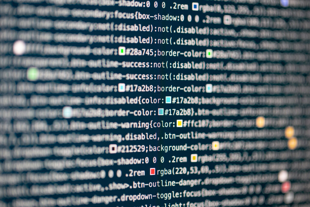 Vibrant Coding Wallpaper: Close-Up of Colorful Computer Code
