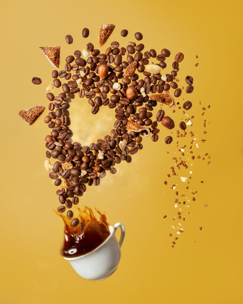 Abstract Coffee Beans & Nuts Wallpaper on Warm Yellow Background