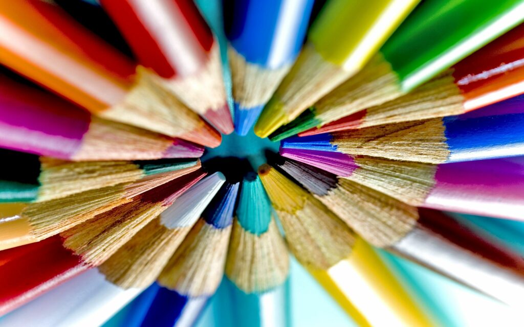 Vibrant Circular Colored Pencils: Colorful Wallpaper Background