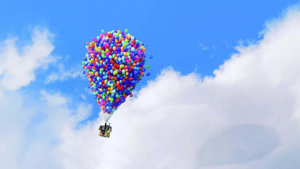 Colorful Balloons Ascending into a Clear Sky - Uplifting Wallpaper