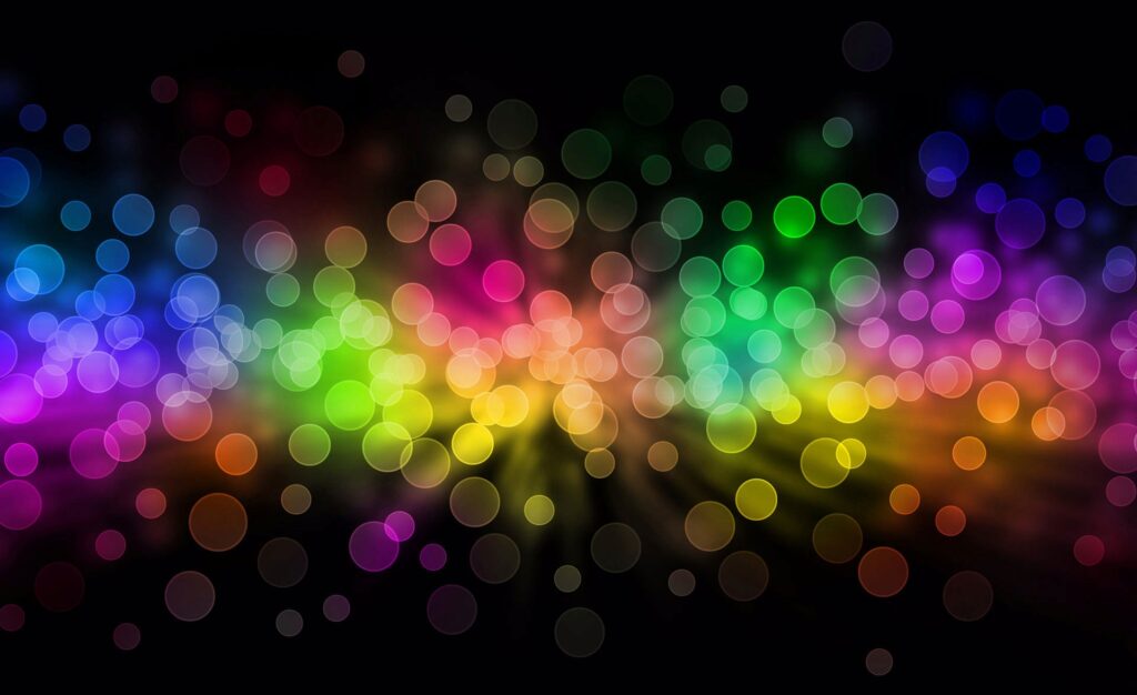Vibrant Multicolored Circle Wallpaper on Dark Background - 1920x1173