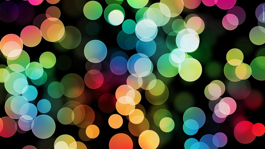 Vibrant Bokeh Wallpaper: Colorful Circles on Dark Background