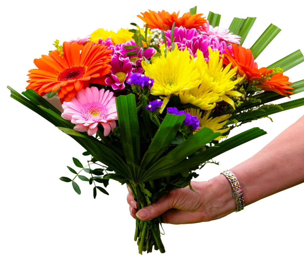 Vibrant Bouquet of Colorful Flowers Held Elegantly in Hand Wallpaper
