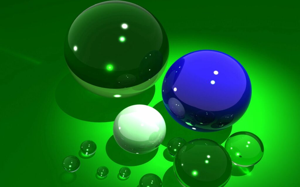 Vibrant 1920x1200 Wallpaper: Colorful Glass Balls on Green Background