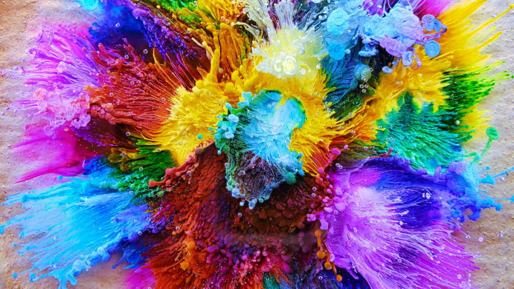 Vibrant Burst: A Captivating Abstract of Colorful Paint Splashes - Eye-catching QHD Wallpaper