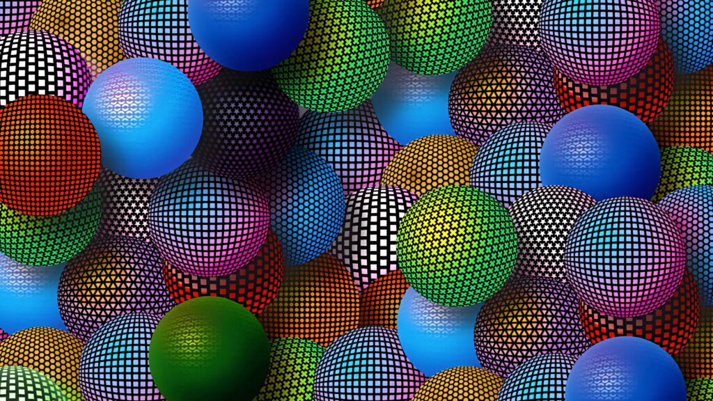 Colorful spheres with geometric patterns in vibrant hues create a modern abstract wallpaper background