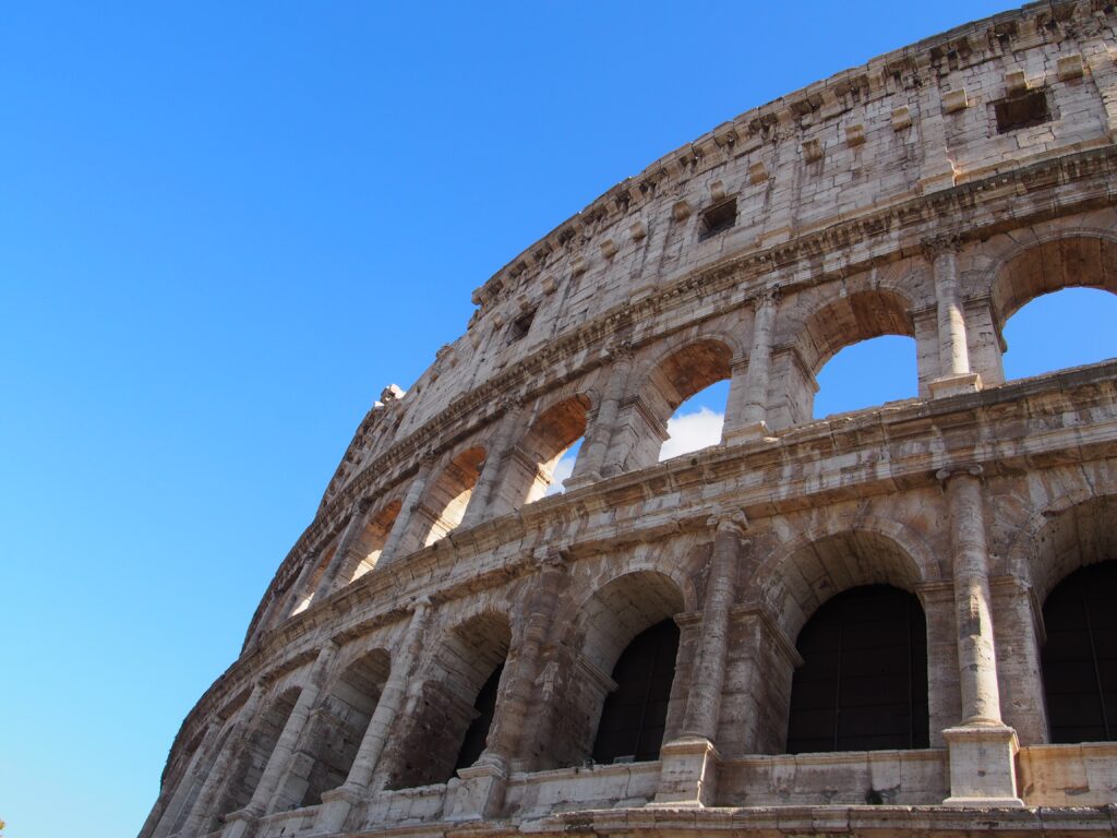 Vibrant Colosseum Wallpaper: Majestic Architecture in Rome