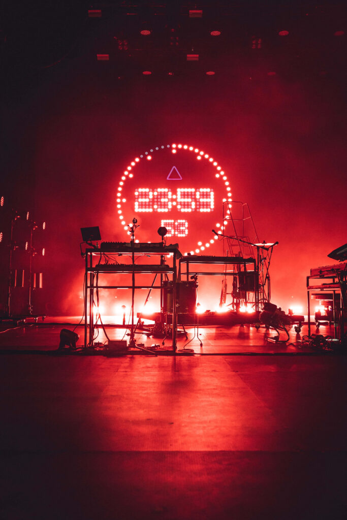 Electrifying Concert Stage Wallpaper: Midnight Vibes & Instruments