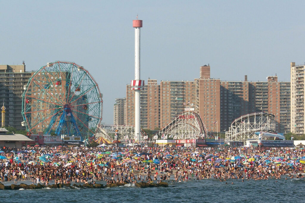 Vibrant Coney Island Wallpaper: Packed Crowds & Iconic Landmarks