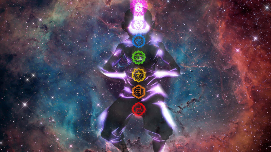 Vibrant Cosmic Meditation Wallpaper with Chakra Energy Symbols