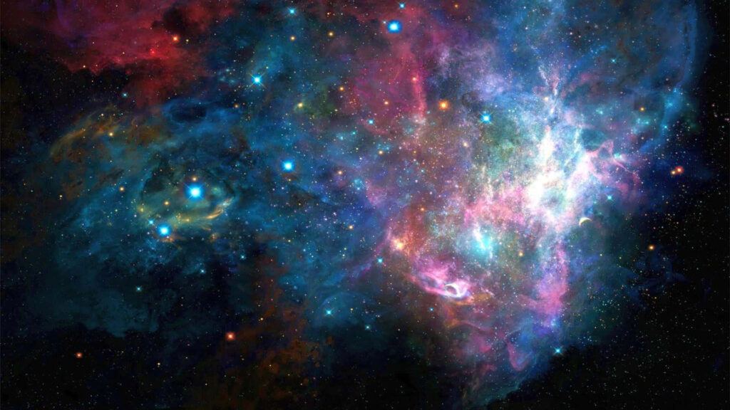 Vivid nebula wallpaper: Colorful blue, pink, and purple cosmic scene with glowing stars.