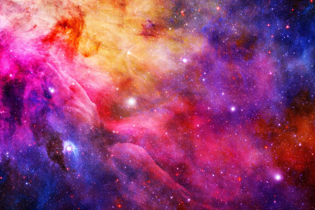 Vibrant cosmic wallpaper featuring pink, purple, orange, and blue nebulae and stars.