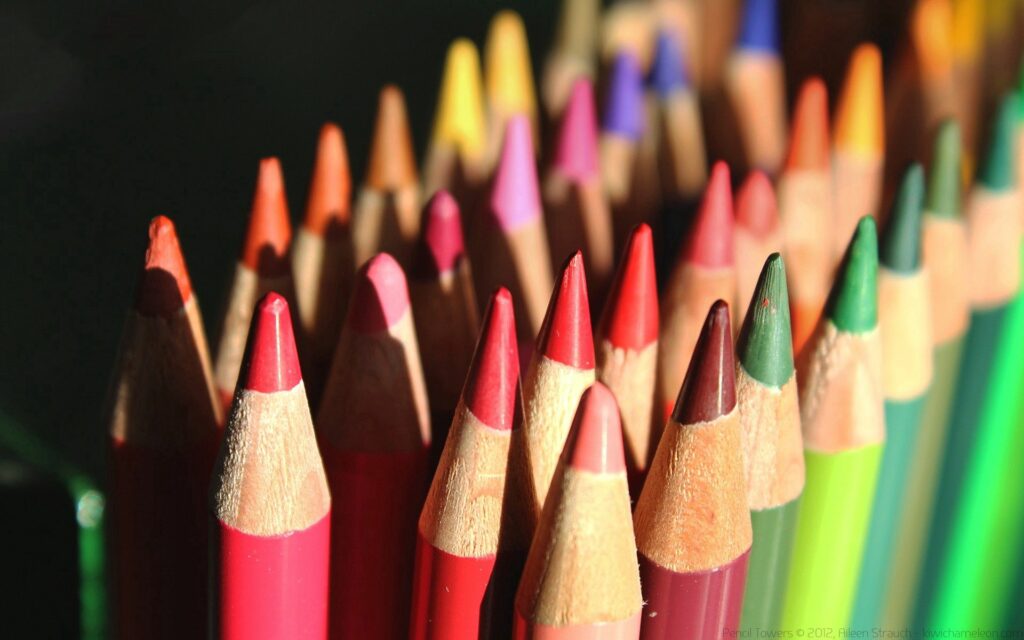Colorful Crayon Wallpaper: Close-Up of Chiseled Tips in Vibrant Hues