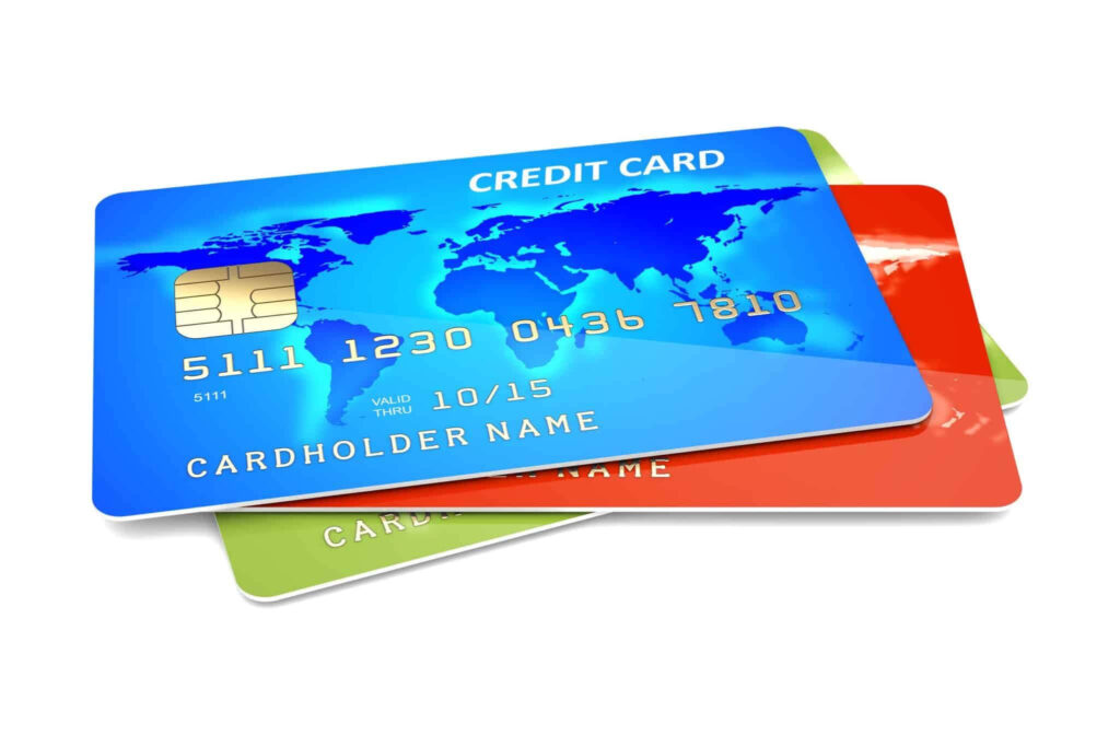 Colorful credit cards wallpaper with blue world map top card showcasing fintech global connectivity