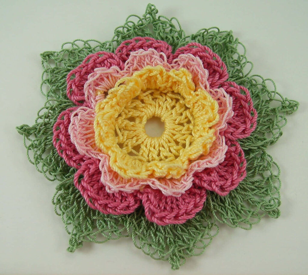 Vibrant Crocheted Flower Wallpaper: Cozy Artistic Background Design