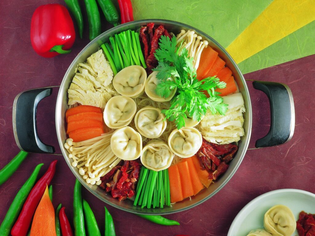 Vibrant Culinary Wallpaper: Dumplings & Fresh Veggies Delight