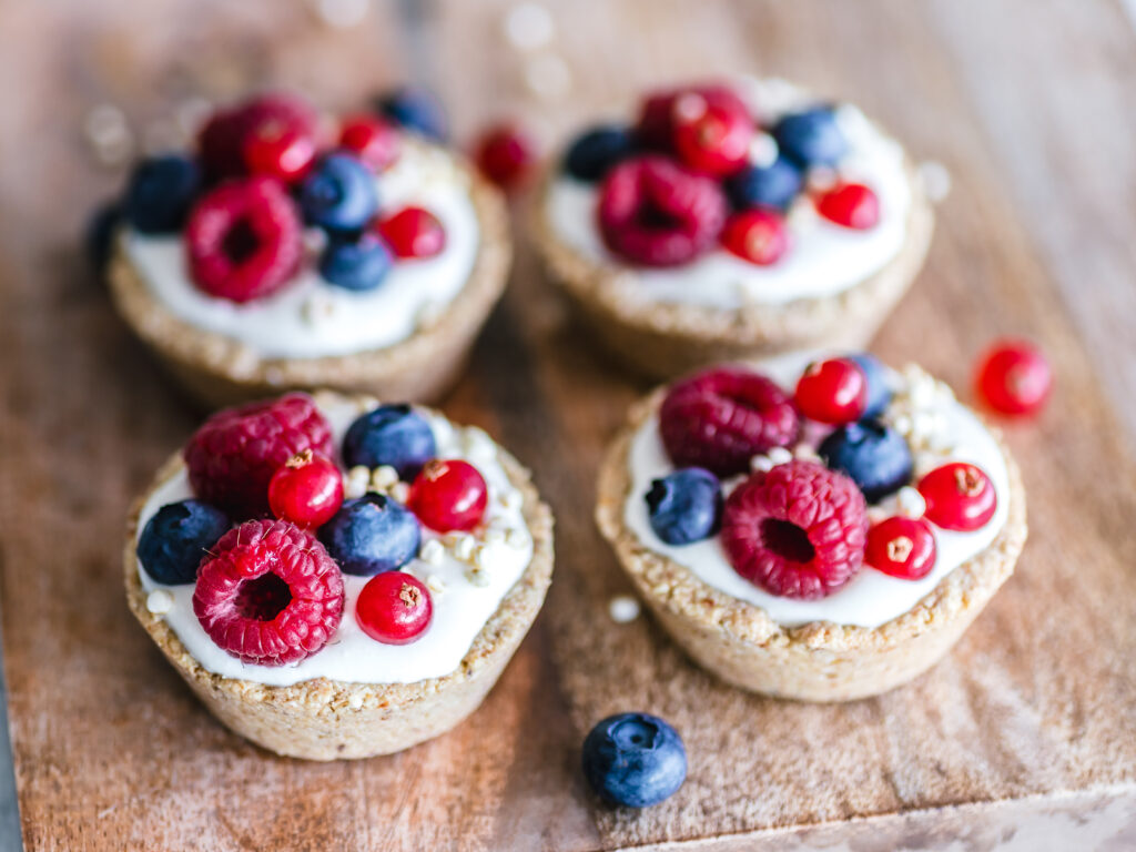 Delicious Cupcake Wallpaper with Berries: Fresh Dessert Background