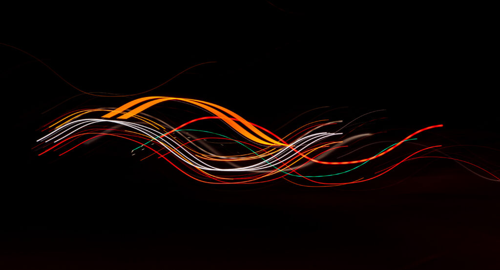 Colorful Curved Light Lines Abstract Wallpaper on Black Background