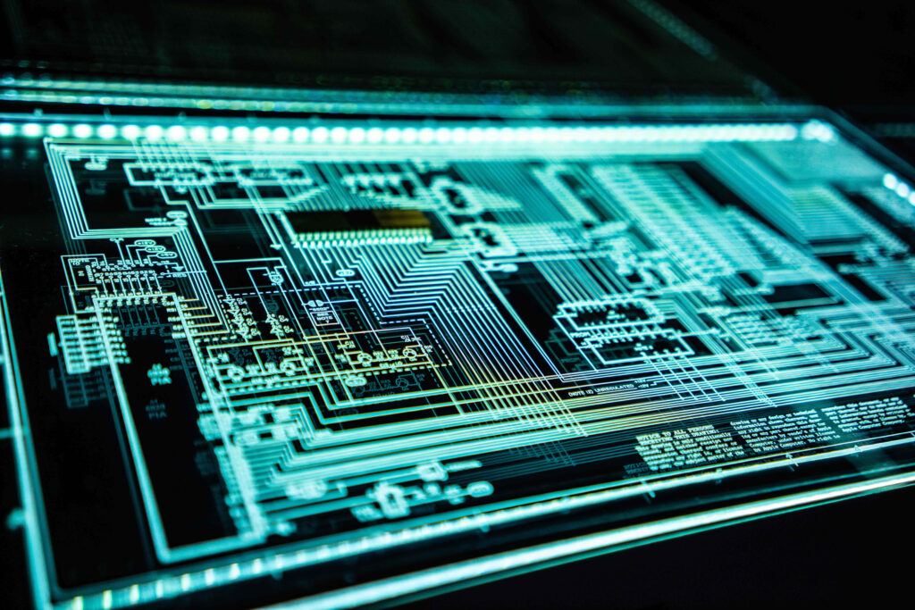 Cyan Circuit Board Wallpaper: Intricate Patterns in Tech Innovation