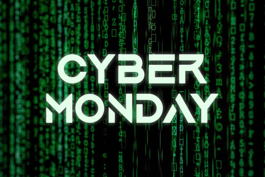 Futuristic Cyber Monday Wallpaper: Glowing Green Typography & Code