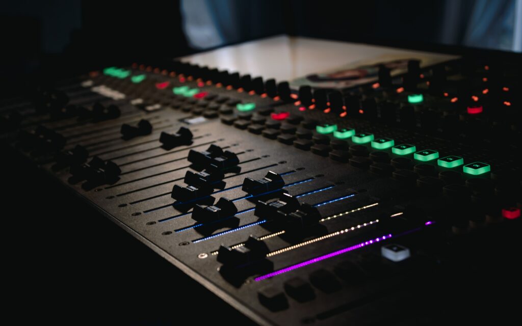 Stunning DJ Console Wallpaper: Vivid Lights & Sleek Design