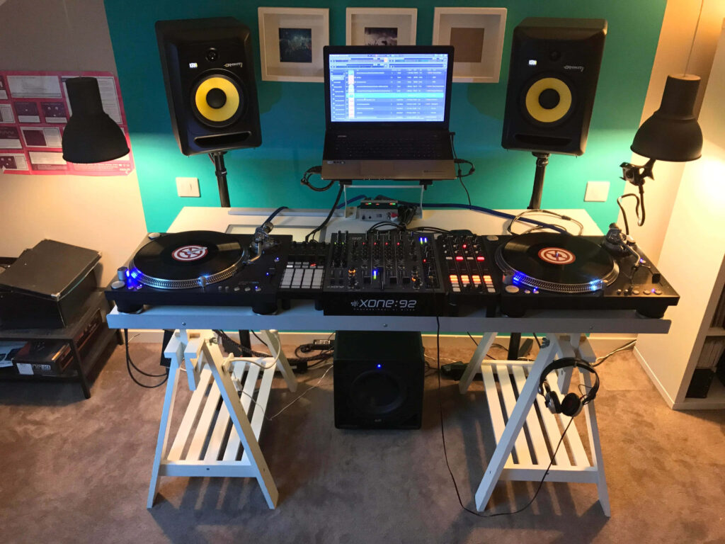 Vibrant DJ Music Studio Wallpaper: Turntables, Mixer & More