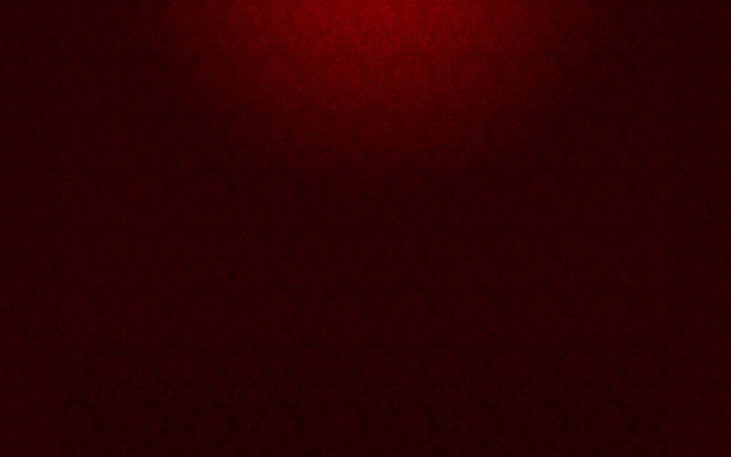 Elegant Dark Red Textured Wallpaper with Spotlight Effect Background