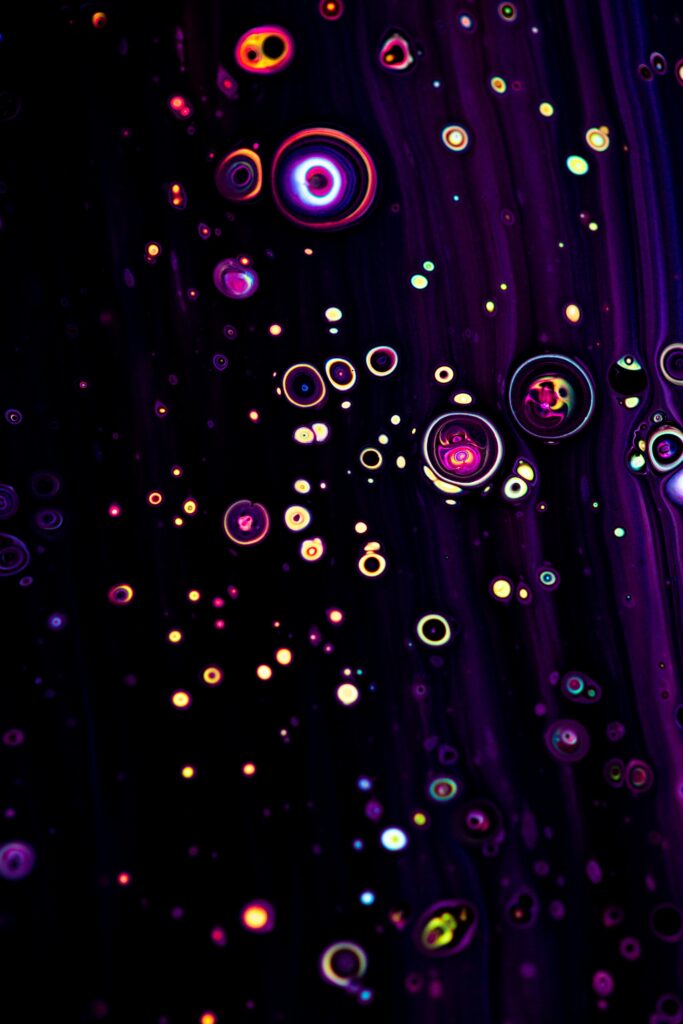 Colorful Bubbles on Dark Background - Artistic Galaxy Wallpaper