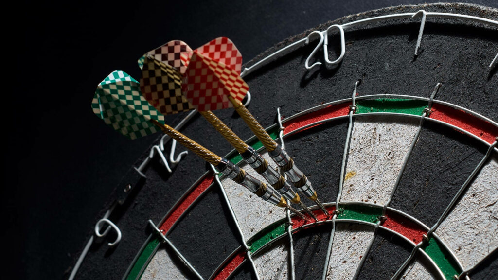 Stunning Dartboard Close-Up: Three Perfect Darts | Sports Wallpaper