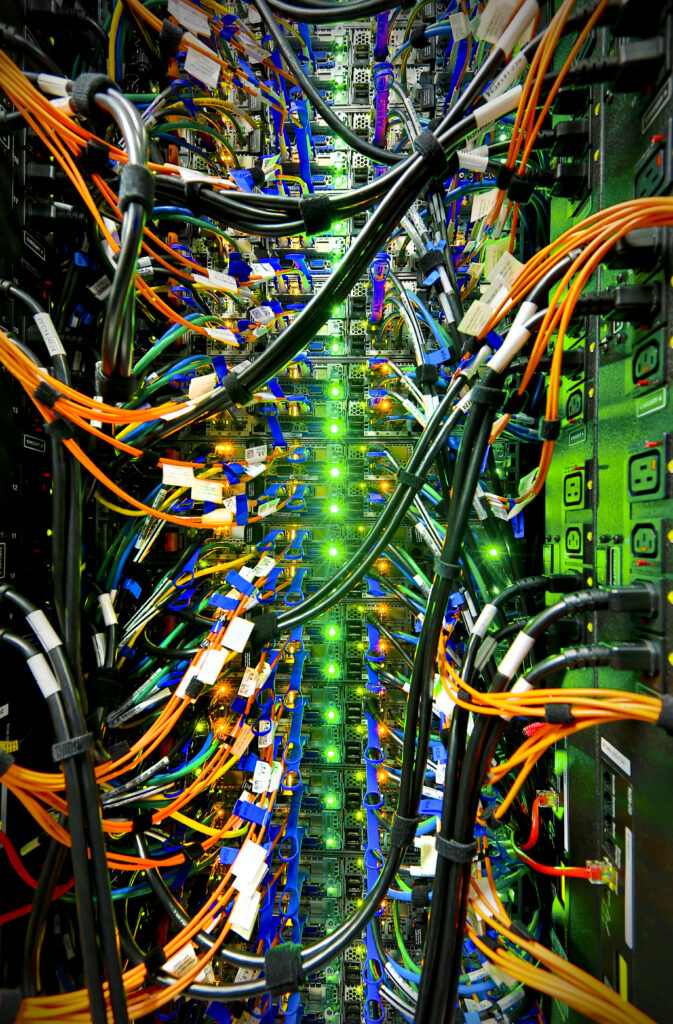 Intricate Cable Network Wallpaper: Vibrant Data Center Background