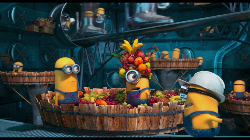 Vibrant Despicable Me Minions Wallpaper: Whimsical Fruit Factory Scene