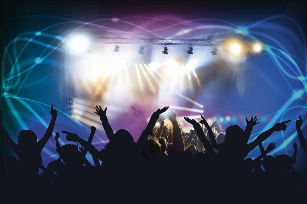 Vibrant Atmosphere: Enthralling Disco Night with Energetic Spectators Wallpaper