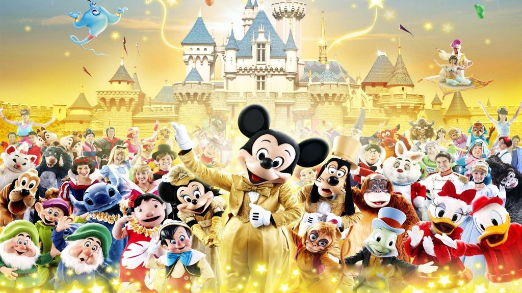 Disney World wallpaper HD with Mickey in gold tuxedo and friends in front of castle background