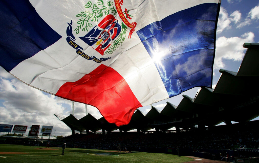 Dominican Republic Flag Wallpaper: Baseball Field Backdrop Under Bright Sky