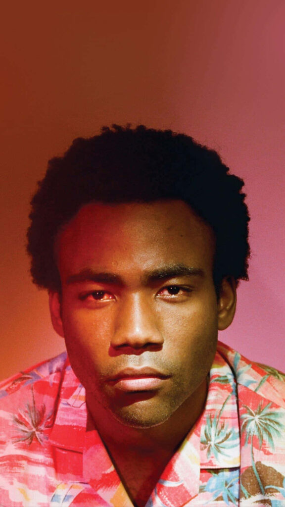 Vibrant Donald Glover Portrait Wallpaper on Rich Red Background