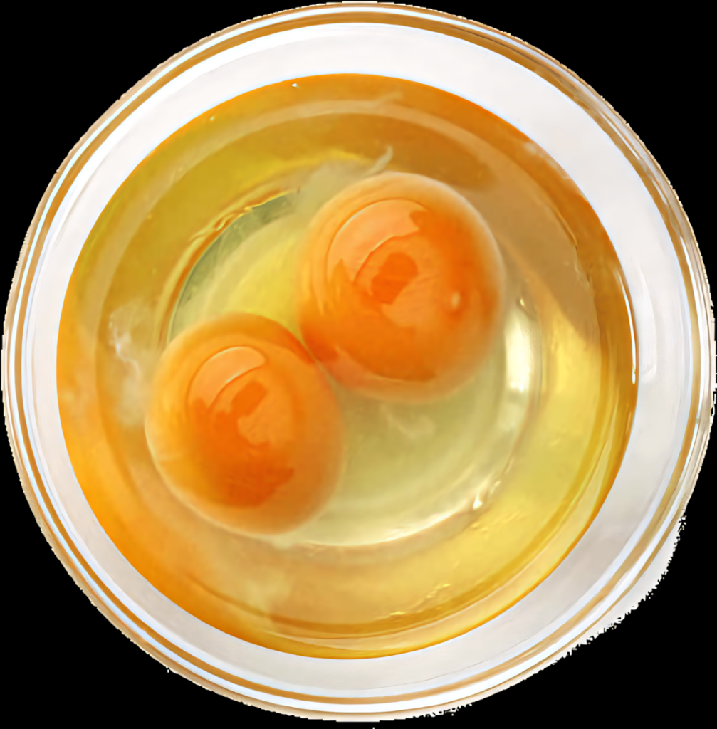 Vibrant Double Yolks in Glass Bowl - Smooth Texture Wallpaper