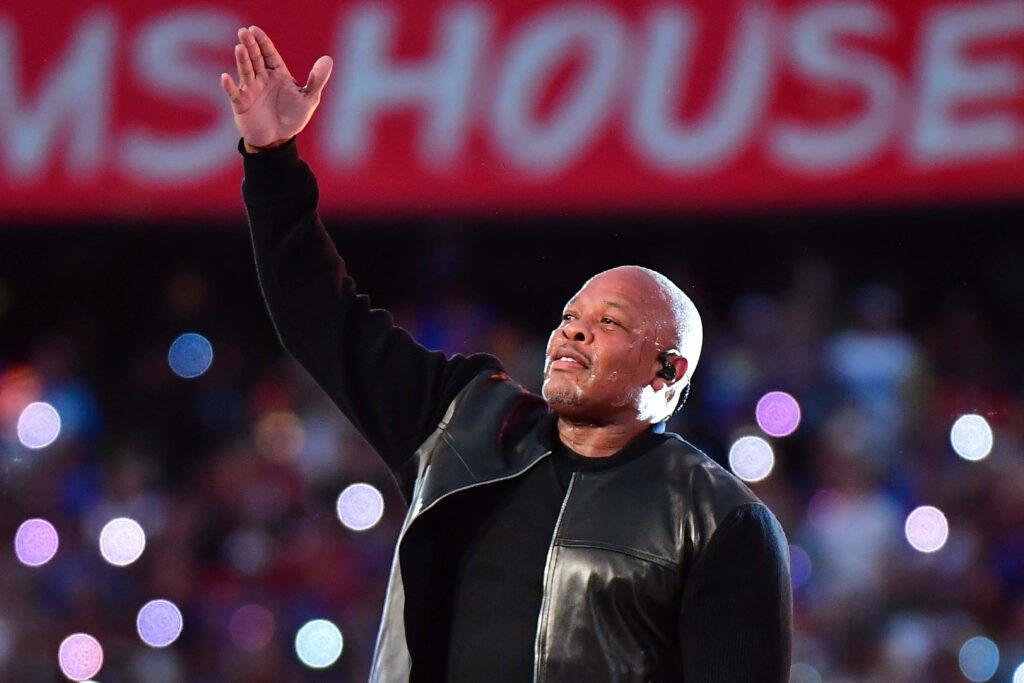 Dynamic Dr. Dre Wallpaper: Vibrant Tribute to a Music Legend