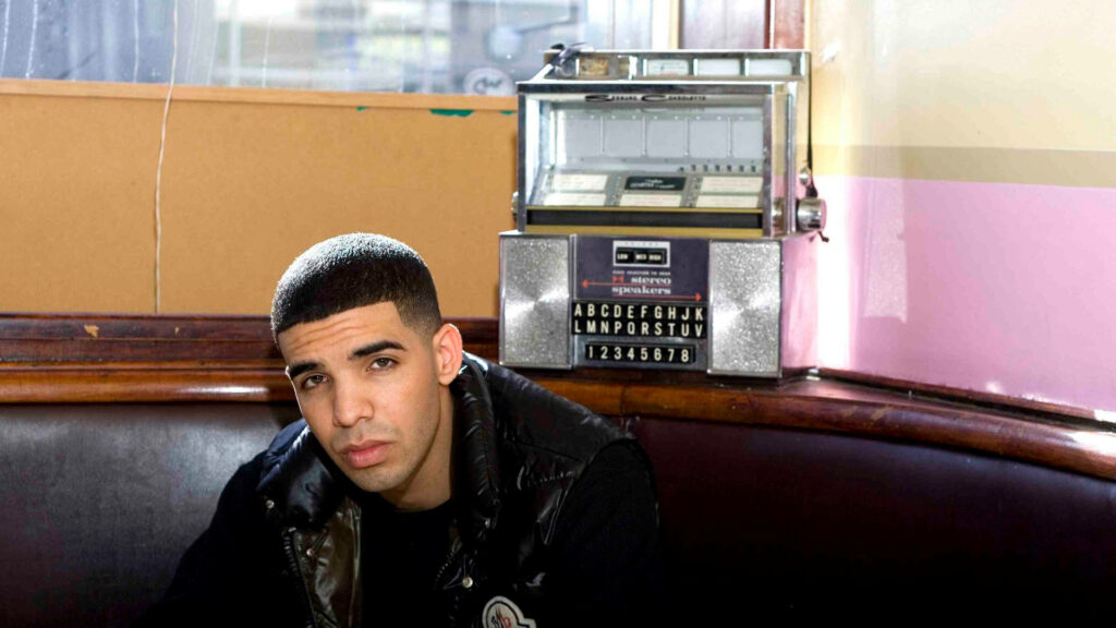 Vibrant Drake Wallpaper: Cozy Retro Setup & Stylish Vibes