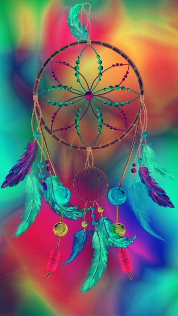 Vibrant dream catcher wallpaper with colorful feathers beads on swirling rainbow gradient background