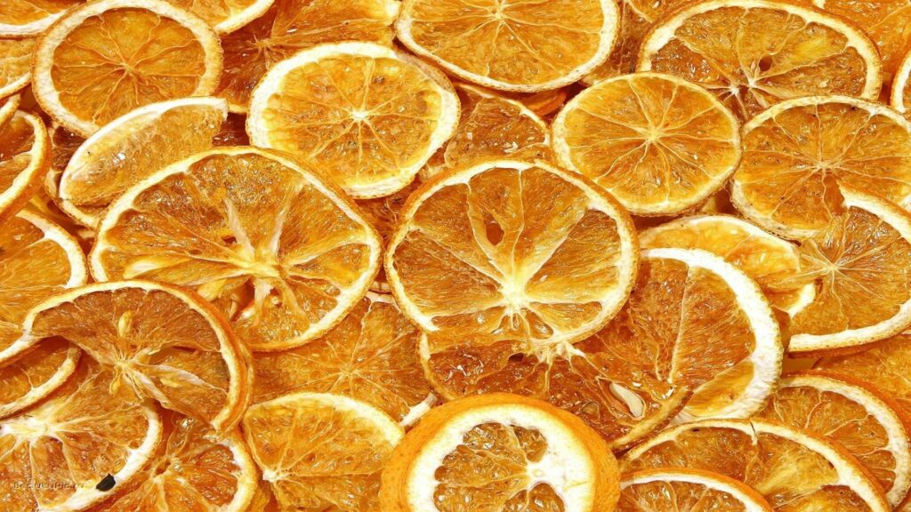 Dried Orange Slices Wallpaper: Vibrant Citrus Texture Background