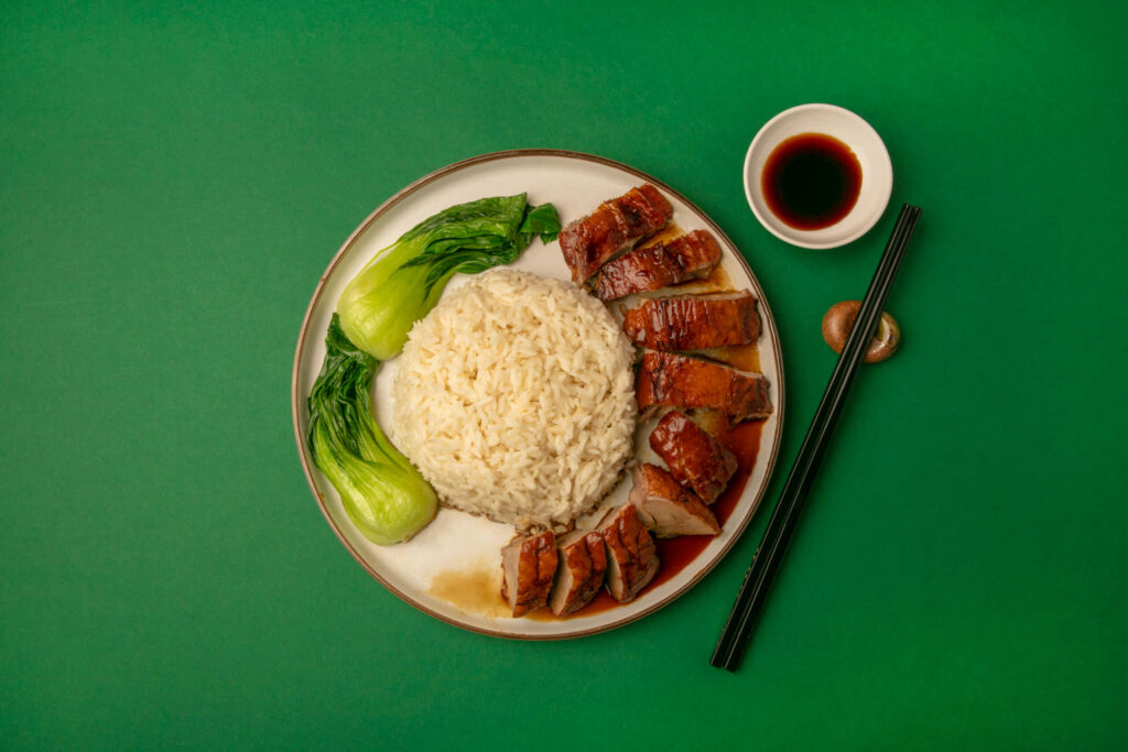 Vibrant Duck Rice with Bok Choy & Soy Sauce Wallpaper Background