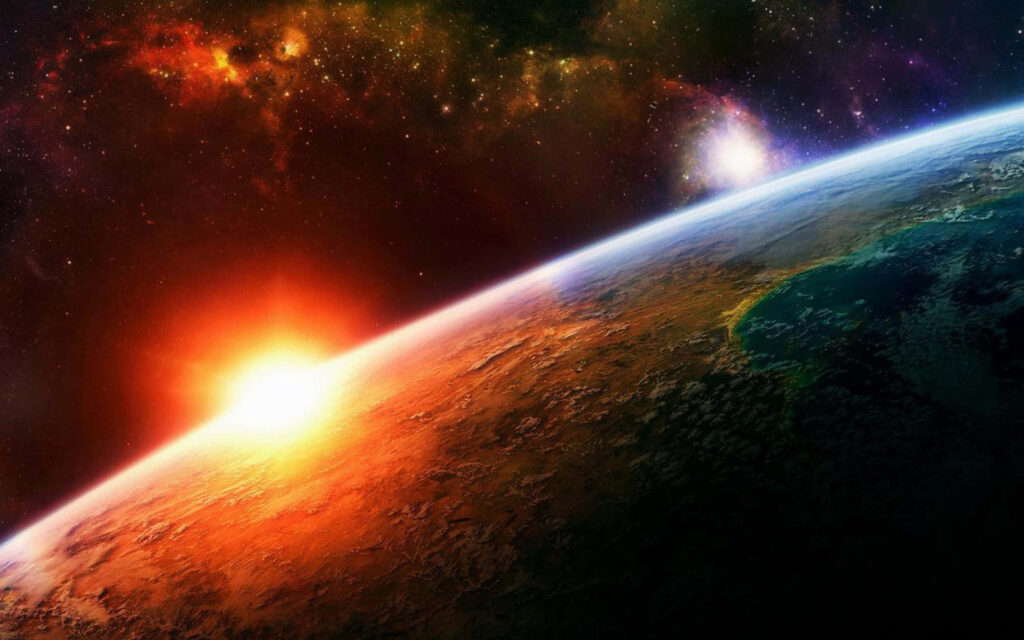 Vibrant Earth wallpaper with sunlit landmasses and starry cosmic background