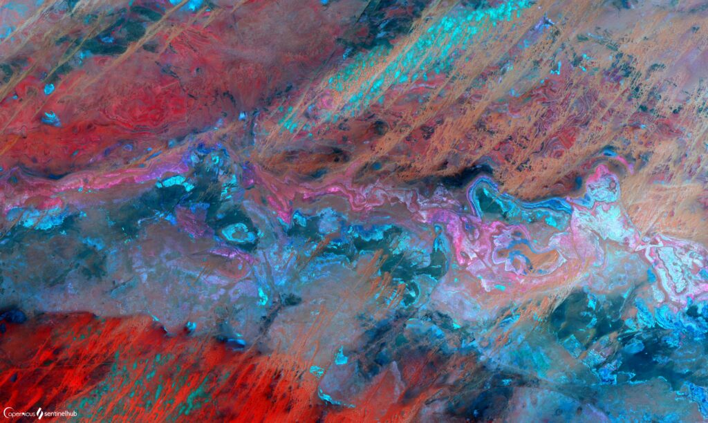 Colorful Earth from Space Wallpaper: Abstract Planet Surface Design
