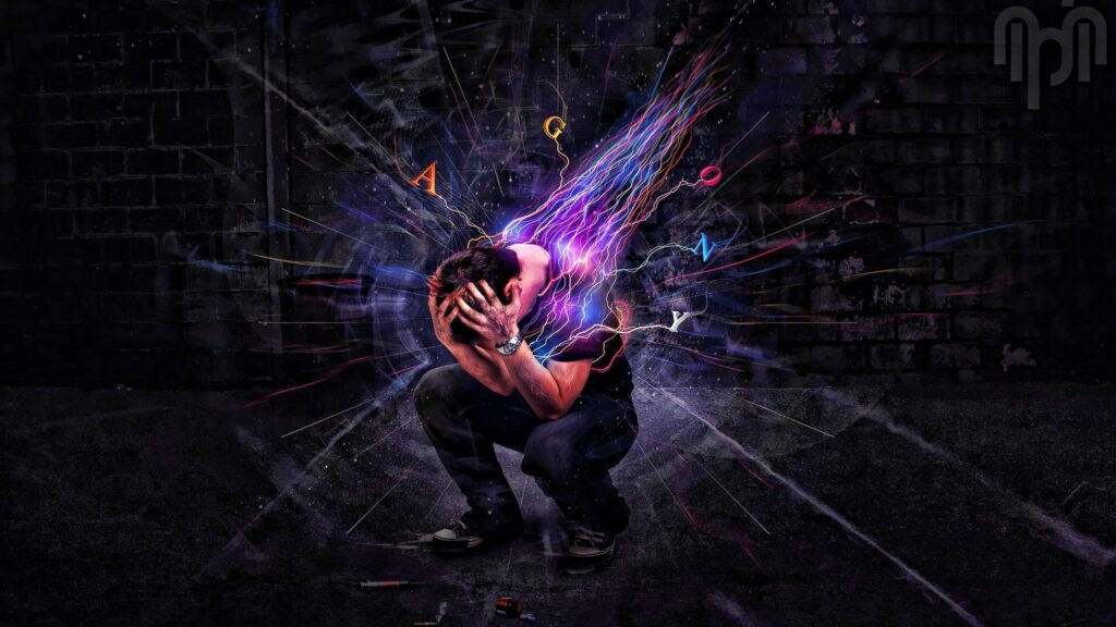 Emotional Burst: Man Crouching Amidst Colorful Expressions Wallpaper