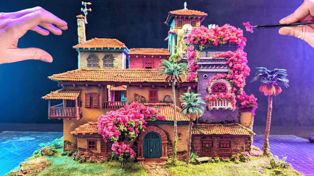 Vibrant Encanto Casa Wallpaper: Colorful Disney-Inspired Background